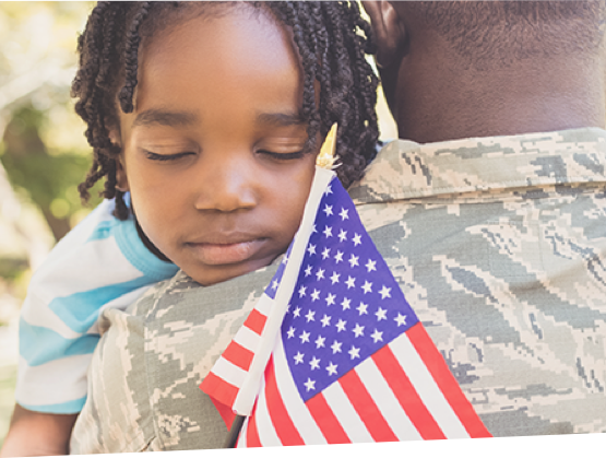 Soldier and daughter hug