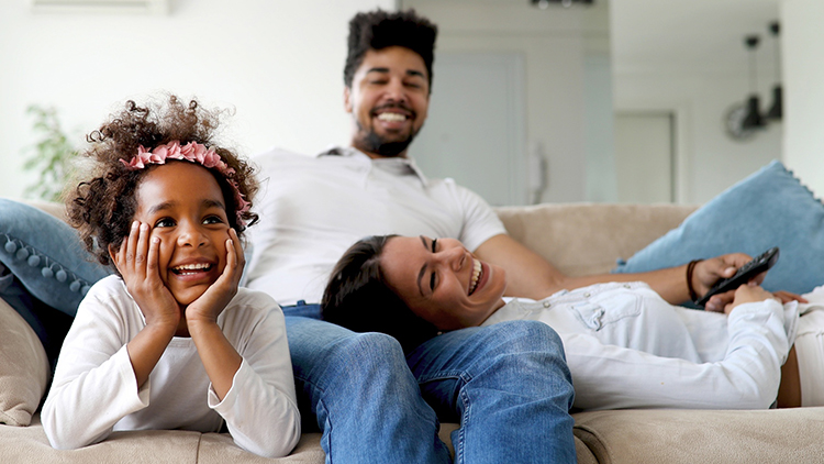 happy family on sofa