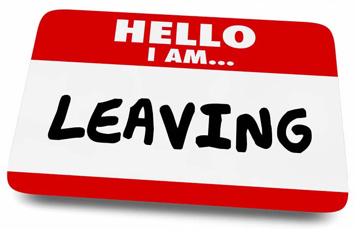 Red and white name tag which reads "hello I am... leaving"