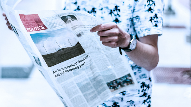 Man reading newspaper