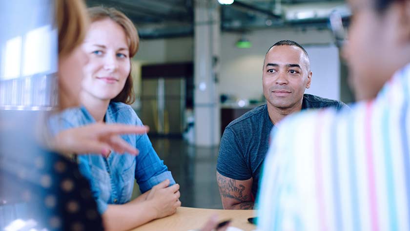 Group of coworkers talking