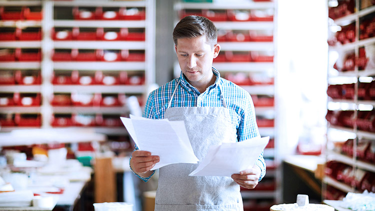 Man looking over documents