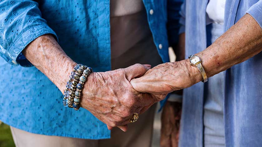 Two elderly women holding hands power of attorney Texas 