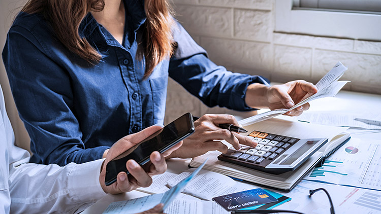 Woman and man calculate finances