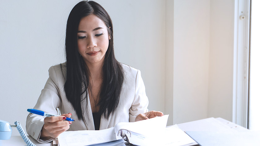 Woman reviewing documents