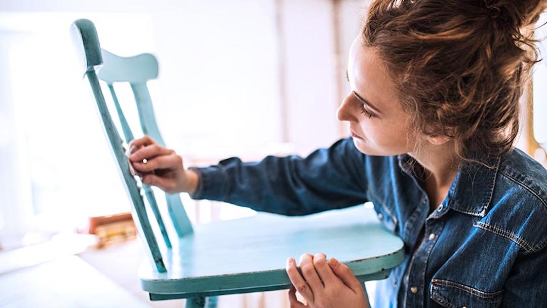 A woodworker puts finishing touches on a chair for a client. Registering your business domain a “doing business as” (dba) could be your ticket to increased professionalism, flexible branding, and compliance with legal requirements. 