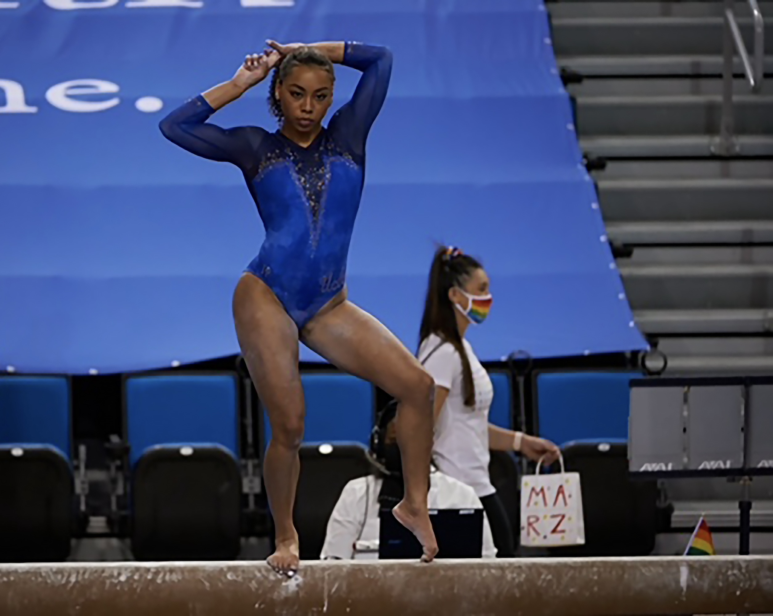 UCLA gymnast and Celestial Seasonings spokeswoman Margzetta Frazier performs on the balance beam.
