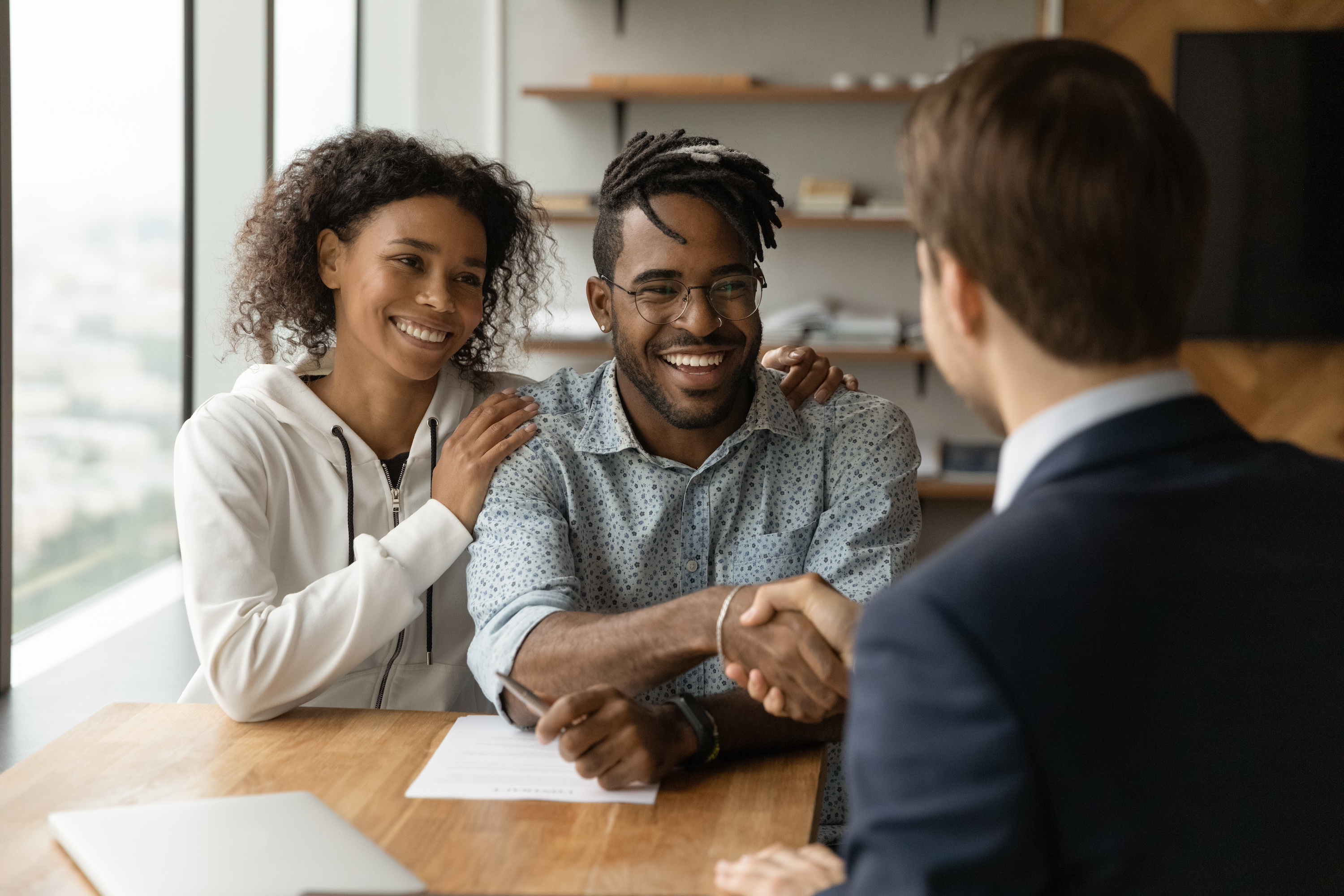 An engaged couple meets with an attorney and finalizes their California prenup agreement.