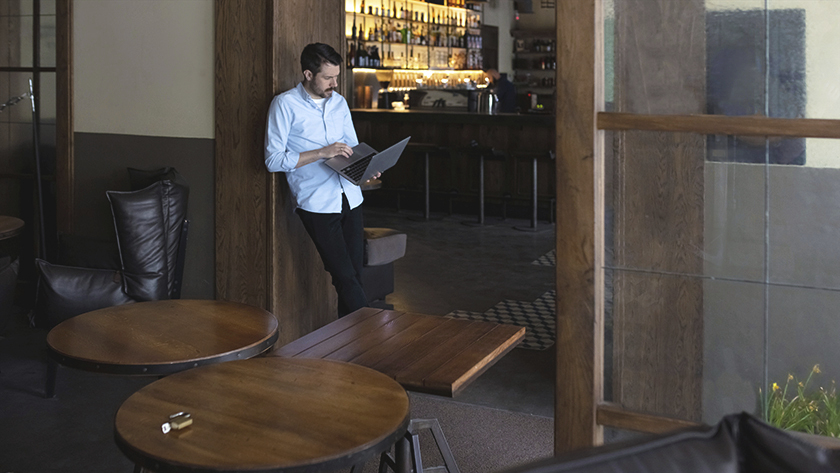 man standing in front of closed business