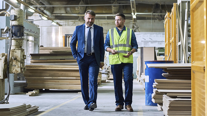 men talking at a job site