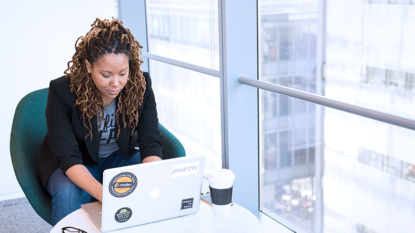 woman-in-office-using-laptop